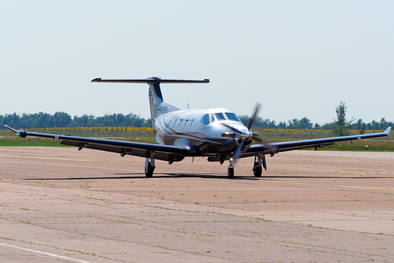 Pilatus PC-12 on ramp, compared against the King Air 350 for Bahamas Out Islands charter