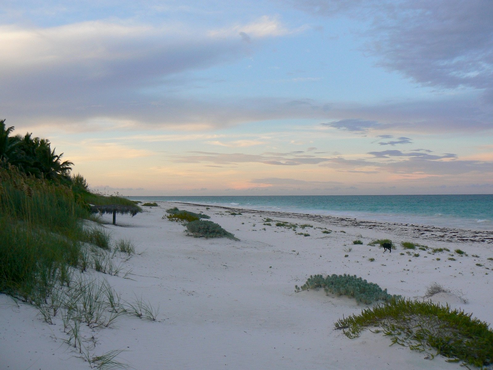 Private beach sunset resembling Parrot Cay